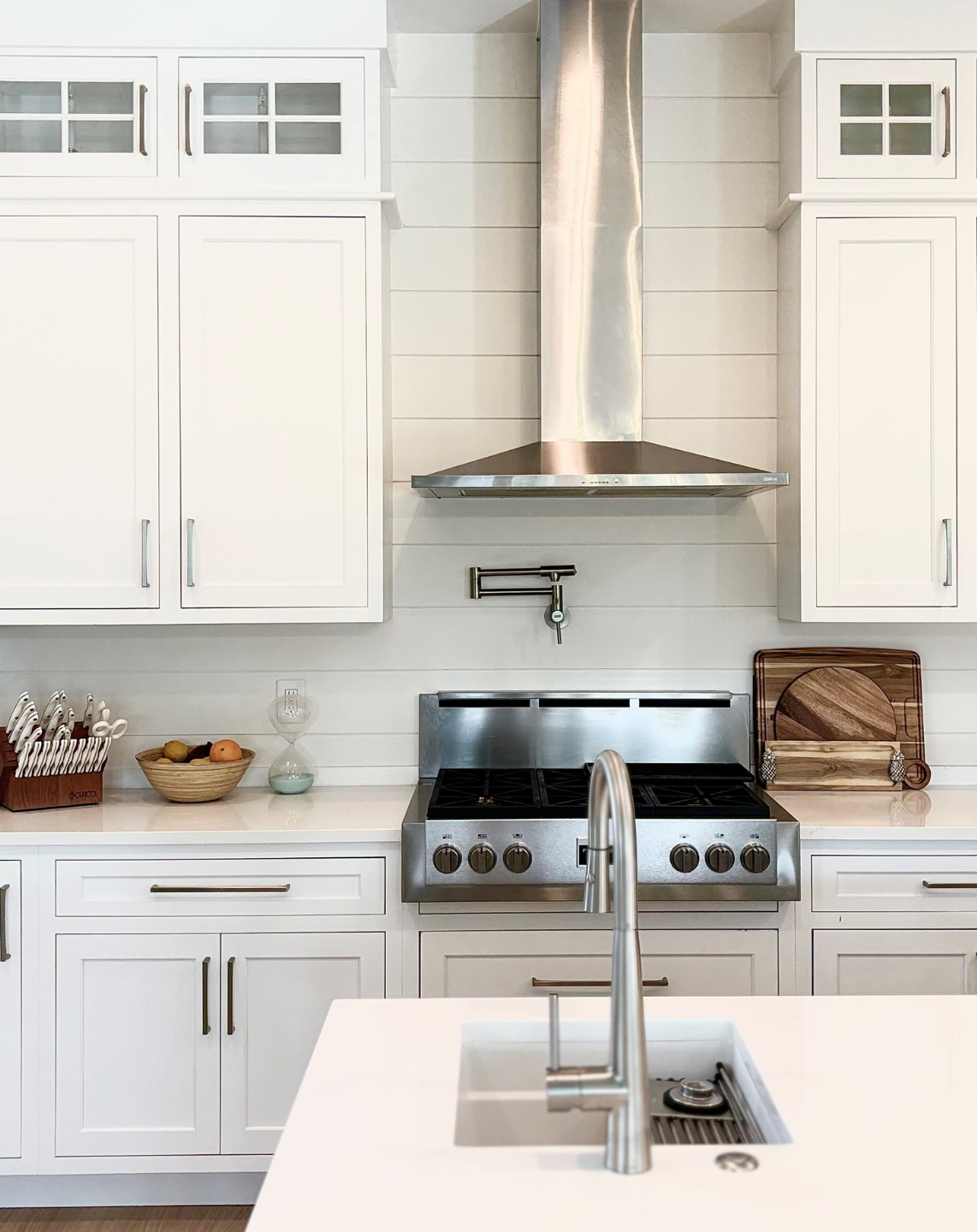 Remodeled Kitchen, cabinets, countertop and decorative backsplash